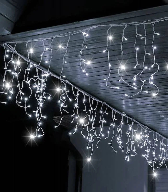 Kalėdinė girlianda - varvekliai 12 m, ŠALTAI BALTA. 300 LED su BLUE FLASH funkcija