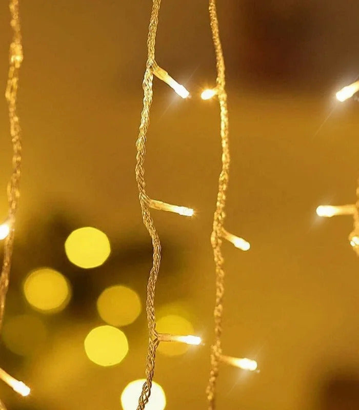 Kalėdinė girlianda - varvekliai 20 m, ŠILTAI BALTA. 500 LED su FLASH funkcija