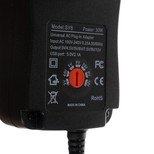 Universalus įkroviklis, maitinimo šaltinis 3-12V AC 100 - 240 0.25A 50/60Hz