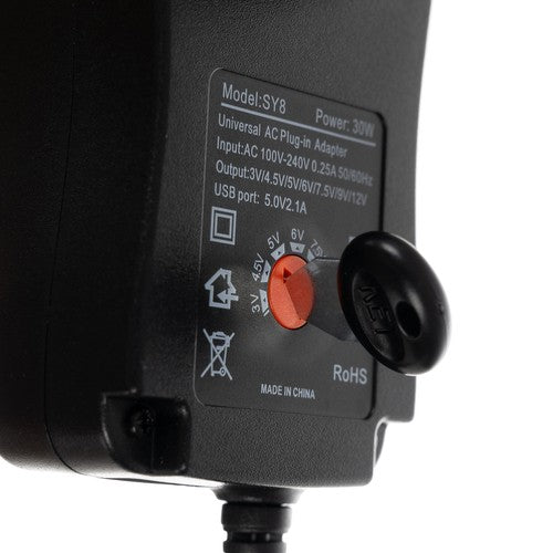 Universalus įkroviklis, maitinimo šaltinis 3-12V AC 100 - 240 0.25A 50/60Hz